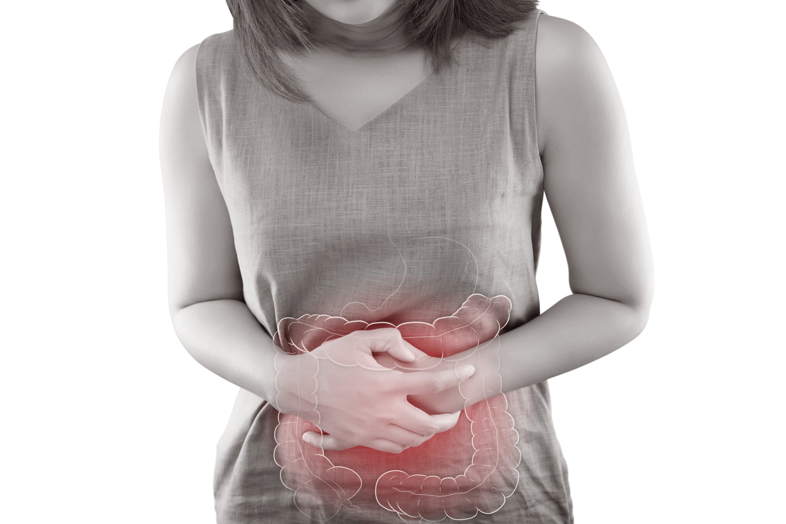 The photo of large intestine is on the woman's body, isolate on